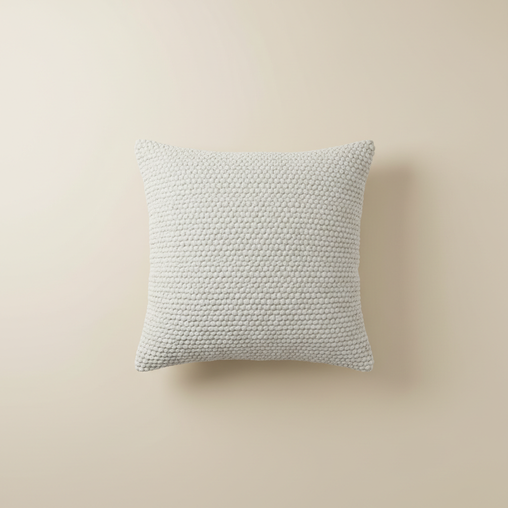 Throw Pillow on warm cream background